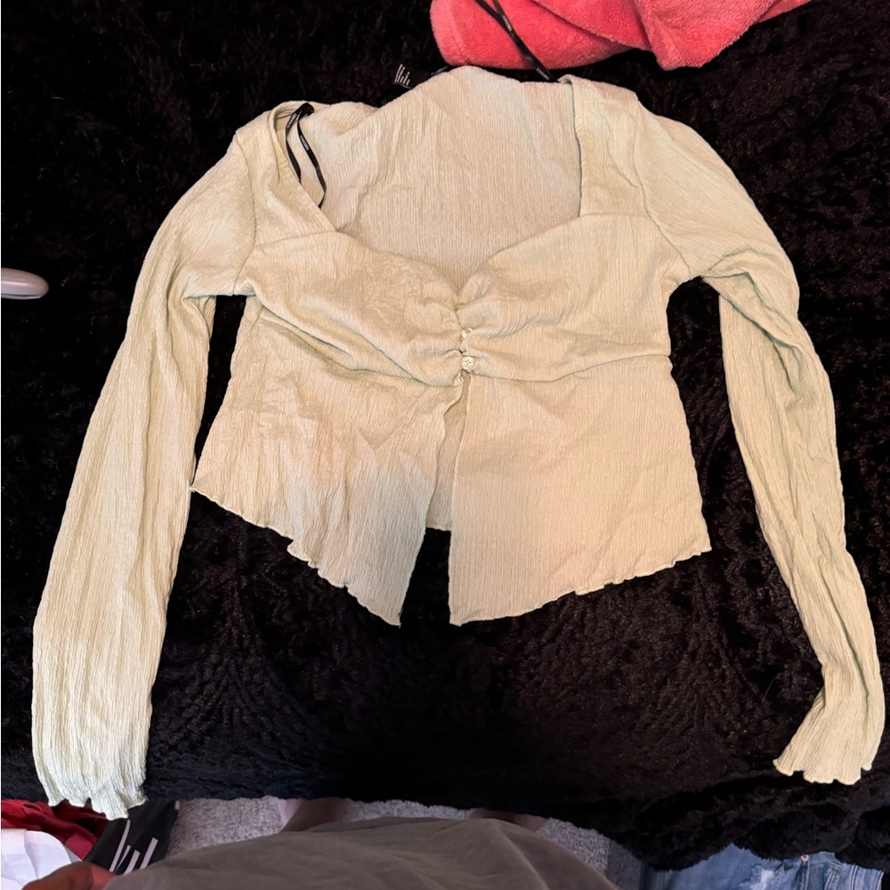 Long sleeve open front green shirt